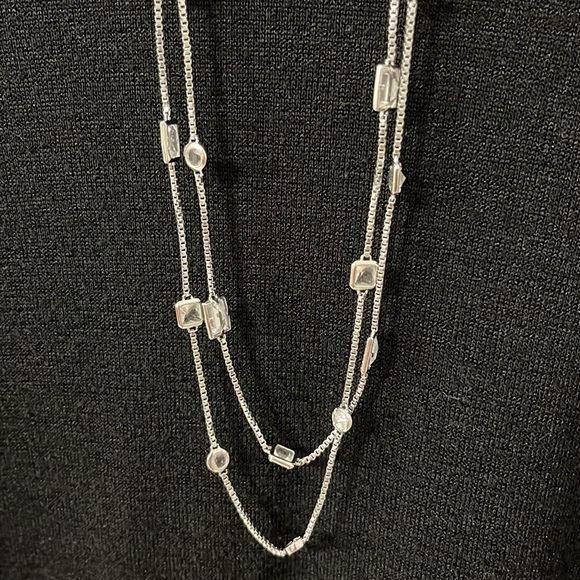 Long silver and clear stone necklace by Mickael Kors - Picture 2 of 3